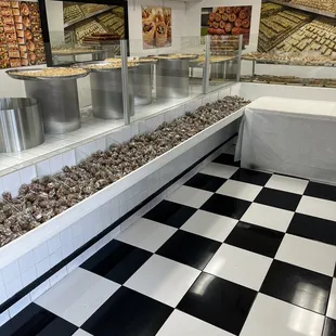a bakery with a checkered floor