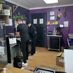 two men working in a kitchen