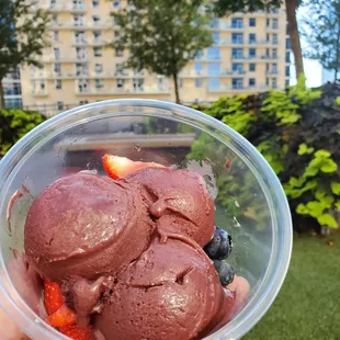 Acai sorbet, organic granola, strawberries, blueberries, banana chips, and drizzled with organic agave nectar.