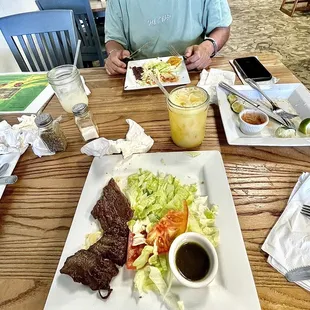 1/2 (shared) of the order of Churrasco con chimichurri. The drink is an invention - Mango &amp; Soursop juice MIXED. (AMAZING surprise)