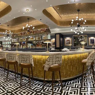 the bar area of a modern restaurant