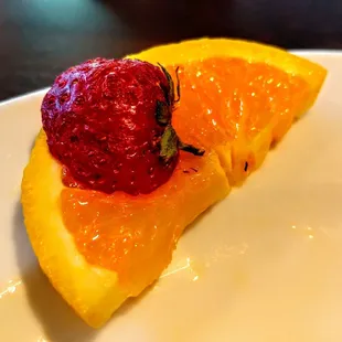 a slice of fruit on a plate