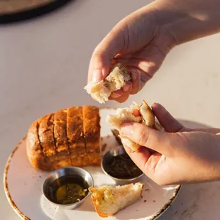 House made sourdough bread with infused olive oils