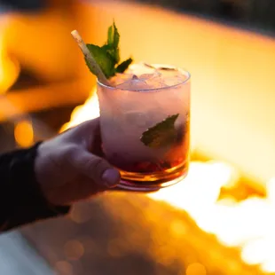 Midnight Wash Cocktail in front of Fire pit