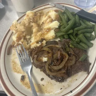 Liver and onions (I couldn&apos;t help but start eating before the photo)