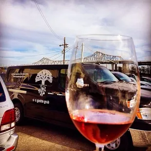 S+S Gastro Grub Catering enjoying a glass of something rosy &amp; the awesome view while Roasting a Whole Pig.