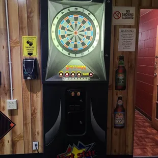 a dart in the center of the room