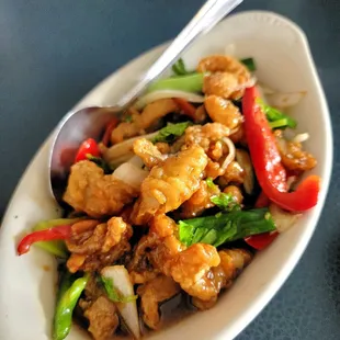 a plate of food with a spoon