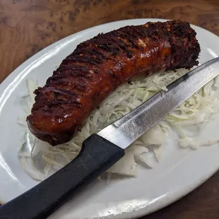 Sai Ooa (Laotian Sausage) Pork, Lemon Grass, Onion, Garlic, Chili Pepper, Salt, Sugar, & Kaffir