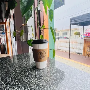 a coffee cup on a table