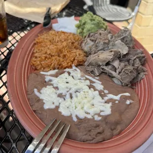 Carnitas plate with rice and beans