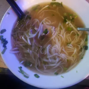 a bowl of soup with noodles