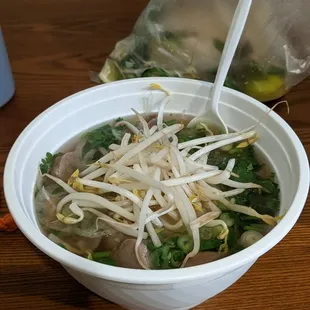 Beef ball pho, prepared to my liking (takeout)