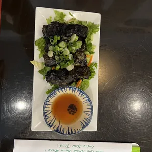 13. Bo La Nho / Grape Leaves Wrapped Beef