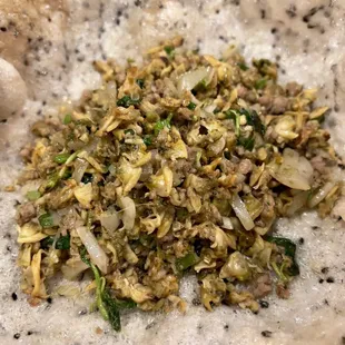 a pile of rice and vegetables