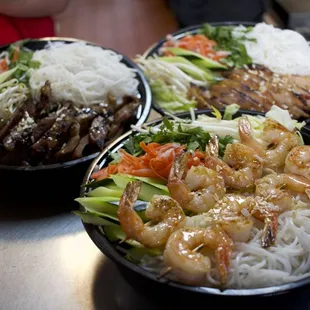 Shrimp/Beef/Chicken/Pork Tray with noodles/rice and salad and sides of choosing cucumber/cilantro/bean sprouts/pickled carrots/daikon.