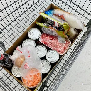 a shopping cart full of food