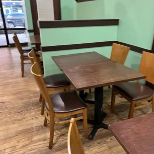 a table and chairs in a restaurant