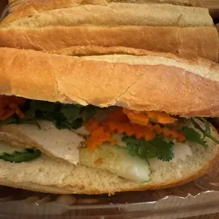 Banh mi with tofu, side view.