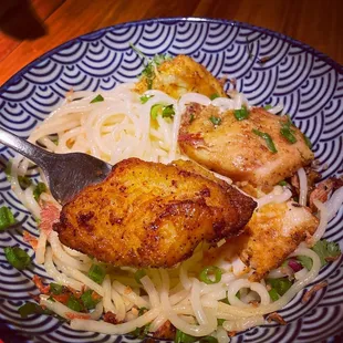 a blue and white plate of food