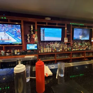 a sports bar with multiple televisions