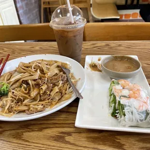 This is Viet Pho&apos;s Pad See Ew, fresh shrimp roll and expresso with condensed milk.