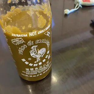 Greenish brown siracha? Apparently the manufacturer changed the formula according to the waitresses.