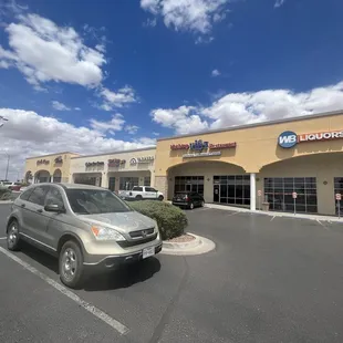 Outside of restaurant. In the shopping center it is far left.