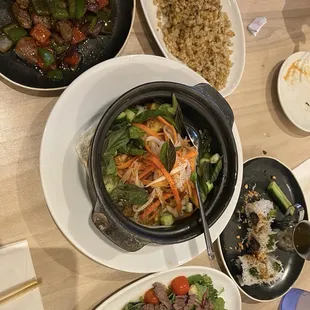 Tumeric fish clay pot, watercress beef salad, bison rolls, &amp; lamb