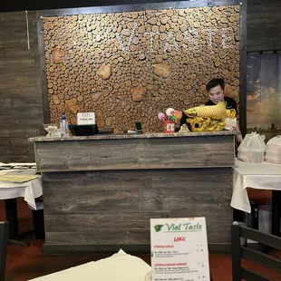 a woman at a restaurant counter