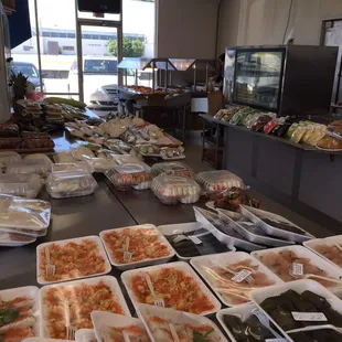 a variety of food in plastic containers