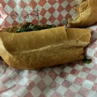 Hand Battered Fish Sandwich half eaten