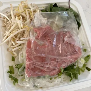 P9. Pho Tai $10.95 plus two extra side noodles $1.95 each