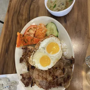 Forgot the name of this dish but it is pork chop and complimentary soup. Comes street style with pork pie etc.