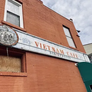 a sign on the side of a building