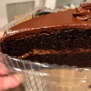 a piece of chocolate cake in a plastic container