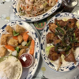 Pad Thai (on the top), chicken wings (on the right), &amp; sweet and sour chicken (on the left)