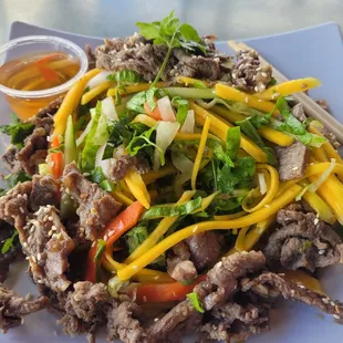 Mango salad with beef ($18 after tax). Pushed the beef aside so you can see the mango salad underneath. I recommend this dish.