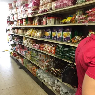a woman shopping in a grocery store