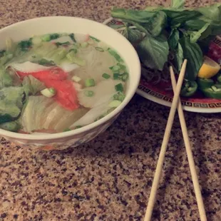 Pho rice noodle with shrimp, crab meat, squid, fish patty
