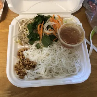 I ordered a Vietnamese bowl topped with spicy lemongrass beef, and this is what I got: just plain noodles, no beef!