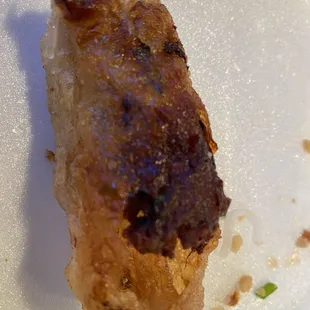 a piece of meat on a plate