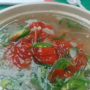 Beef pho with added siracha