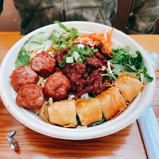 Red beef Vermicelli Bowl with Vietnamese meatballs.