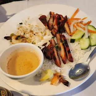 Shrimp &amp; chicken plate, with most of the shrimp already eaten.