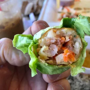 Egg Rolls: fresh shrimp &amp; vegetable. Wrap in lettuce &amp; herbs. Dip in sauce &amp; enjoy.