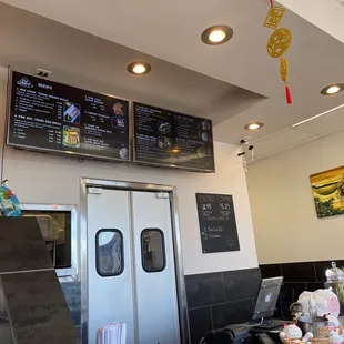 the menus on the wall above the counter