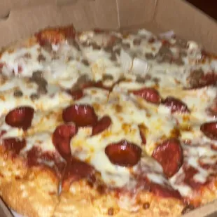 1/2 pepperoni and 1/2 sausage with onion.