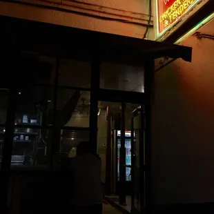 a neon sign for a restaurant