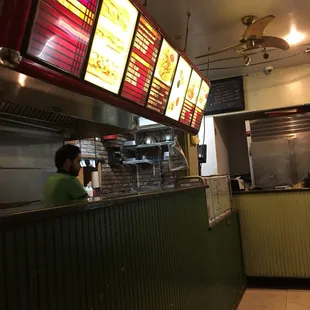 a restaurant counter with menus